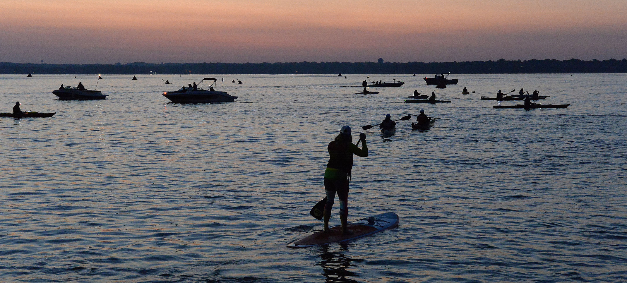 Rescue kayakers on Lake Monona at dawn